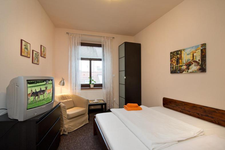 Hotel U Zlateho Byka Písek Rum bild